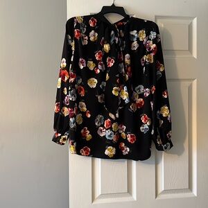 Ann Taylor Black Blouse with Multicolor Floral Design and a bow in the back 👒👚👑